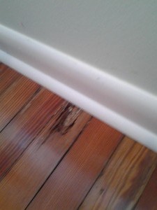 Old water damage, heart pine flooring